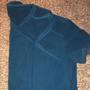 2 Scrub tops $25 for both